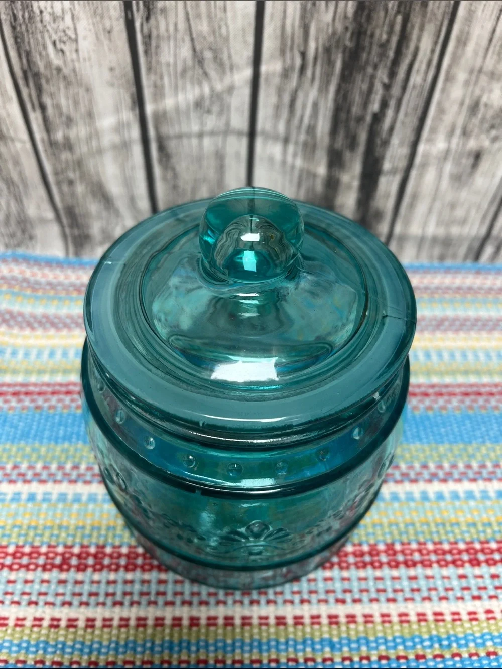 The Pioneer Woman “Cassie” glass embossed canister-small 33oz- 5”x5.75”- Teal